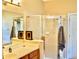 Bathroom boasts a large shower and updated vanity at 6879 Remington View Ct, Orlando, FL 32829