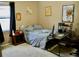 Bright bedroom includes a comfortable bed and workspace at 6879 Remington View Ct, Orlando, FL 32829