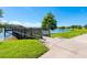 Wooden fishing dock extending over the lake at 6879 Remington View Ct, Orlando, FL 32829