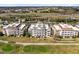 Aerial view showcasing Reunion community and highway at 7618 Sandy Ridge Dr # 103, Reunion, FL 34747