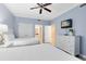 Bedroom with two twin beds and ample closet space at 7618 Sandy Ridge Dr # 103, Reunion, FL 34747