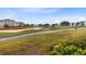 Scenic view of the meticulously maintained golf course landscape at 7618 Sandy Ridge Dr # 103, Reunion, FL 34747