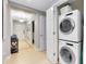 Stackable washer and dryer in convenient laundry room at 7618 Sandy Ridge Dr # 103, Reunion, FL 34747