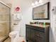 Bathroom with vanity, toilet, and shower at 7654 Comrow St # 101, Kissimmee, FL 34747