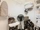 Laundry room with washer, dryer, and shelving at 7654 Comrow St # 101, Kissimmee, FL 34747