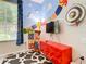 Fun ' play area featuring a Toy Story theme, games, and a TV at 7654 Comrow St # 101, Kissimmee, FL 34747