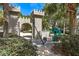 Castle-themed playground entrance with chain barriers and landscaping at 7654 Comrow St # 101, Kissimmee, FL 34747