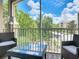 Private screened balcony with outdoor furniture at 7664 Comrow St # 301, Kissimmee, FL 34747