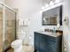 Updated bathroom with shower, toilet and vanity at 7664 Comrow St # 301, Kissimmee, FL 34747