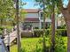 Back of house with deck and walkway to dock at 10110 Royal Island Ct, Orlando, FL 32836