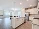 Modern kitchen with stainless steel appliances and island at 11024 Folklore Street, Winter Garden, FL 34787