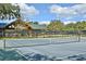 Two tennis courts with a pavilion in the background at 1209 Royal Oak Dr, Winter Springs, FL 32708