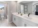 Clean bathroom with double vanity and updated fixtures at 12439 Shipwatch St, Orlando, FL 32832
