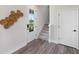 Entryway with staircase and modern wall art at 12439 Shipwatch St, Orlando, FL 32832