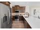 Kitchen with stainless steel appliances and white countertops at 12439 Shipwatch St, Orlando, FL 32832