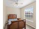 Bright bedroom with wood bed frame and window blinds at 1569 Victoria Way, Winter Garden, FL 34787