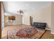 Open concept living space featuring tile flooring, a modern sofa, and seamless flow to the kitchen at 1569 Victoria Way, Winter Garden, FL 34787