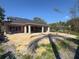 The backyard of this house has a covered patio and plenty of room for outdoor entertaining at 1830 Park Lake St, Orlando, FL 32803