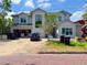 Contemporary two-story home with large windows and a freshly painted exterior at 1830 Park Lake St, Orlando, FL 32803