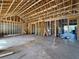 New home construction: Interior framing and plumbing are underway at 1830 Park Lake St, Orlando, FL 32803