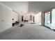 Spacious living room featuring high ceilings and sliding glass doors leading outside at 1830 Park Lake St, Orlando, FL 32803