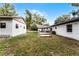 Large backyard with detached workshop and patio area at 200 Florida Ave, Geneva, FL 32732