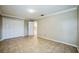 Bedroom with tiled floors, neutral walls, white trim, and closet for ample storage at 2225 Kettle Dr, Orlando, FL 32835