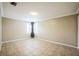 A tiled bedroom with natural lighting and neutral walls providing a calm atmosphere at 2225 Kettle Dr, Orlando, FL 32835