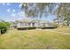 House with a well-maintained lawn and walkway at 2225 Kettle Dr, Orlando, FL 32835