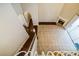 View of foyer from second story featuring staircase with white railing and fireplace at 2225 Kettle Dr, Orlando, FL 32835