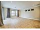 Spacious Gathering room with tile flooring and large windows at 2225 Kettle Dr, Orlando, FL 32835