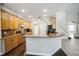 Updated kitchen featuring wood cabinets, granite counters, and stainless steel appliances at 2225 Kettle Dr, Orlando, FL 32835