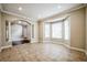 Spacious living room with bay window and tile floors at 2225 Kettle Dr, Orlando, FL 32835