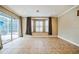 Living room features tile floors, a sliding door, and a cozy bay window at 2225 Kettle Dr, Orlando, FL 32835