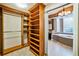 Spacious walk-in closet, custom shelving and rods at 2225 Kettle Dr, Orlando, FL 32835