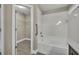 Clean bathroom with a tub and walk-in closet at 2267 Santa Lucia St, Kissimmee, FL 34743
