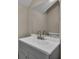 Simple bathroom with gray vanity and a modern faucet at 2267 Santa Lucia St, Kissimmee, FL 34743