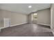 Large bedroom with wood-look floors and dormer window at 2267 Santa Lucia St, Kissimmee, FL 34743