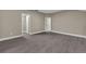Spacious bedroom with wood-look floors and access to closets at 2267 Santa Lucia St, Kissimmee, FL 34743