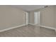Spacious bedroom with wood-look floors and ample closet space at 2267 Santa Lucia St, Kissimmee, FL 34743