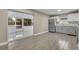 Modern kitchen with grey cabinets and stainless steel appliances at 2267 Santa Lucia St, Kissimmee, FL 34743