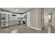 Modern kitchen with grey cabinets and stainless steel appliances at 2267 Santa Lucia St, Kissimmee, FL 34743
