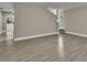 Living room with grey wood-like tile floors and back door at 2267 Santa Lucia St, Kissimmee, FL 34743