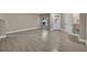 Spacious living room with grey wood-like tile floors at 2267 Santa Lucia St, Kissimmee, FL 34743