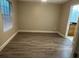 Bedroom with laminate flooring and a window at 236 Afton Sq # 309, Altamonte Springs, FL 32714