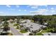 Community overview: homes with tree-lined streets at 26030 Newcombe Cir, Leesburg, FL 34748