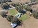 Aerial view of home, pool, and expansive yard at 274 W Kings Hwy, Center Hill, FL 33514