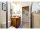 Clean bathroom with granite vanity and shower at 3045 Beach Palm Ave, Kissimmee, FL 34747