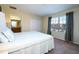 Bright bedroom with a comfortable queen-size bed and ample closet space at 3045 Beach Palm Ave, Kissimmee, FL 34747