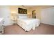Queen bed, closet, and neutral decor at 3045 Beach Palm Ave, Kissimmee, FL 34747